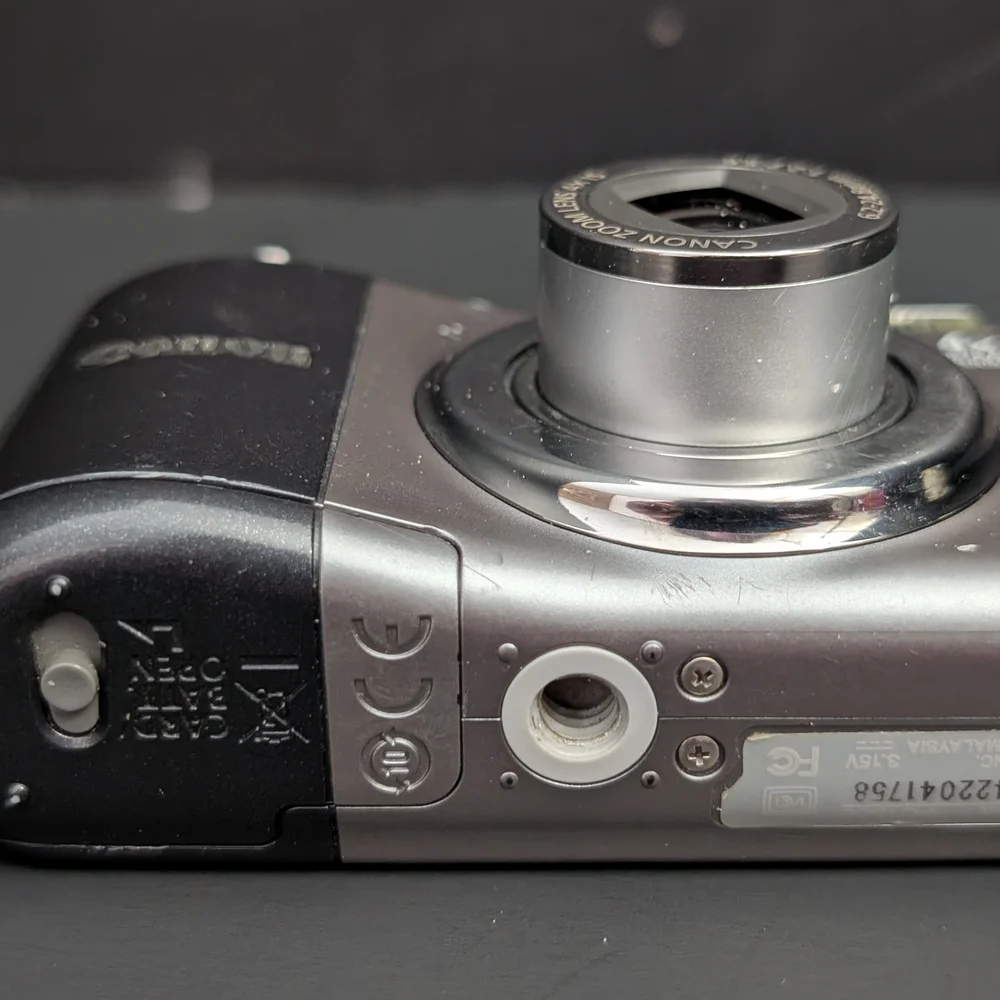 Canon PowerShot A1000 IS PC1309 10 MP optical zoom camera FOR PARTS ONLY 22026D4